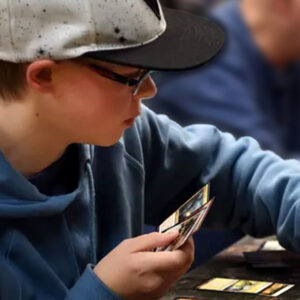 Youth playing collectible card games.